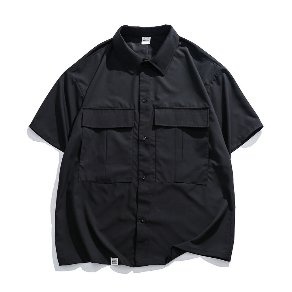 Choose from three colors. Solid color short-sleeved work shirt with pocket.