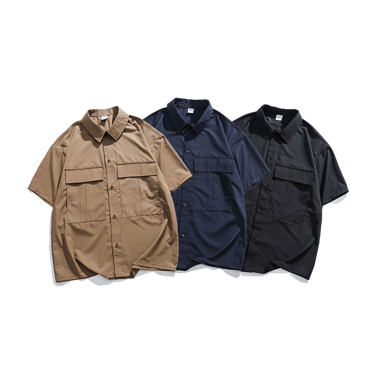 Choose from three colors. Solid color short-sleeved work shirt with pocket.