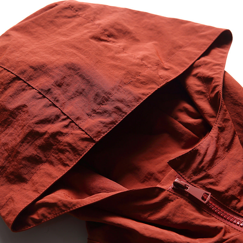 Color-coordinated irregular zipper hooded jacket
