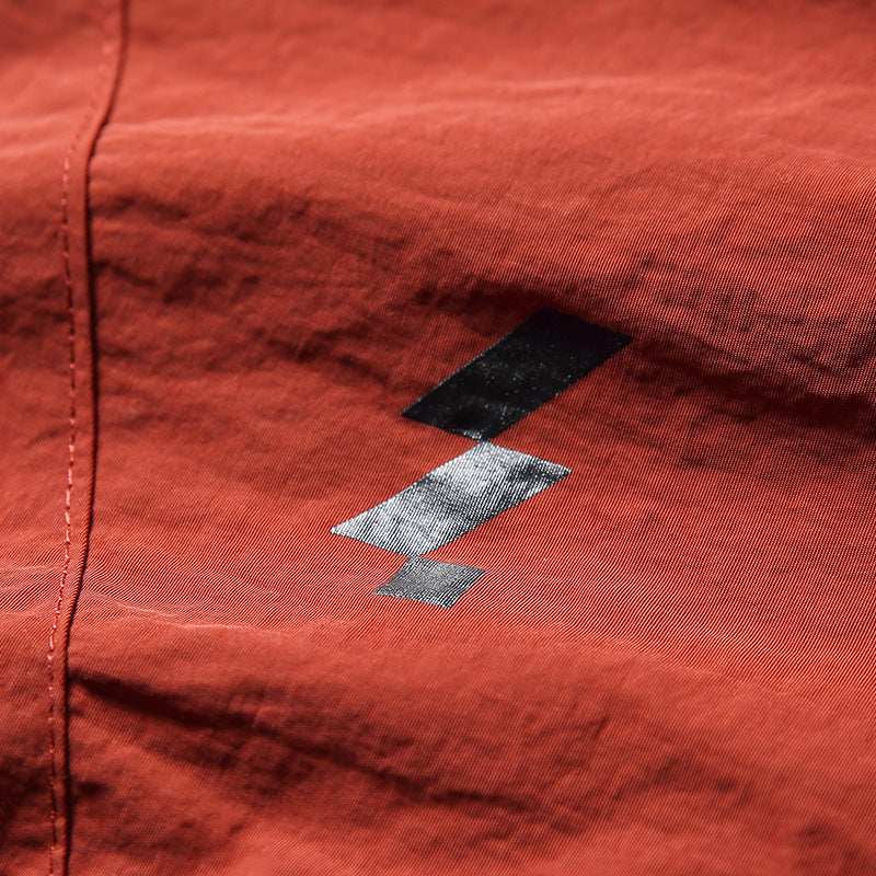 Color-coordinated irregular zipper hooded jacket