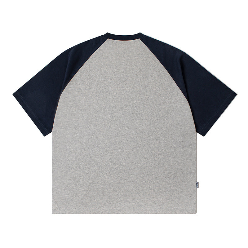 Color-coordinated embroidered raglan sleeve short-sleeved T-shirt