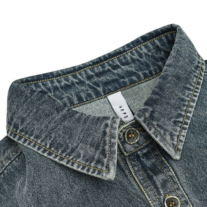 Used and washed denim work shirt