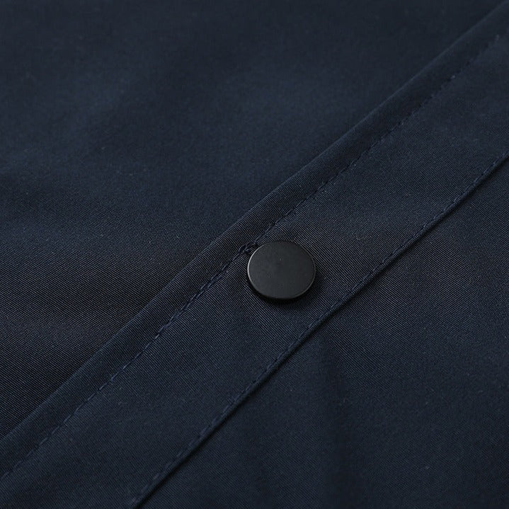 Three-dimensional pocket work vest with Velcro badge