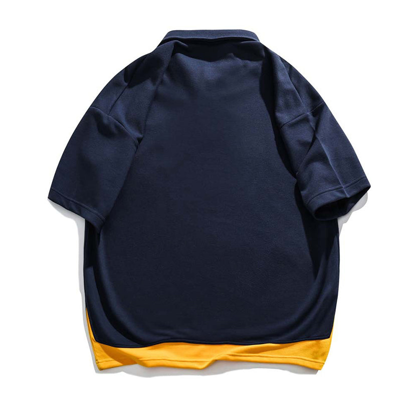 Faux layered colored polo shirt with embroidered hem
