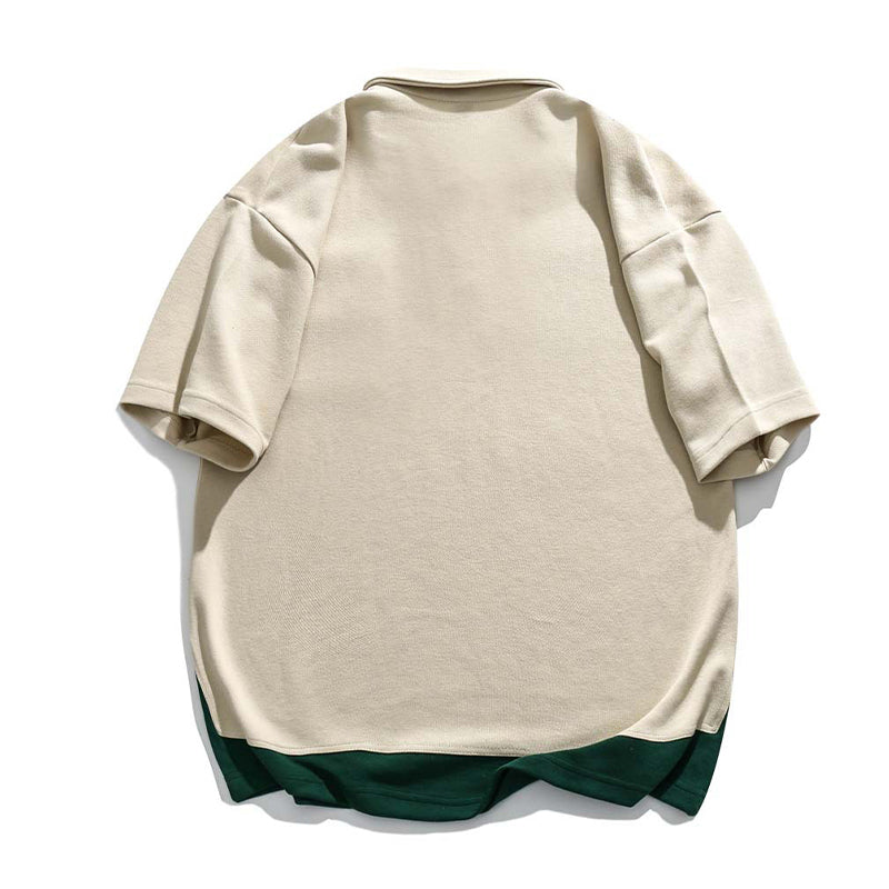 Faux layered colored polo shirt with embroidered hem