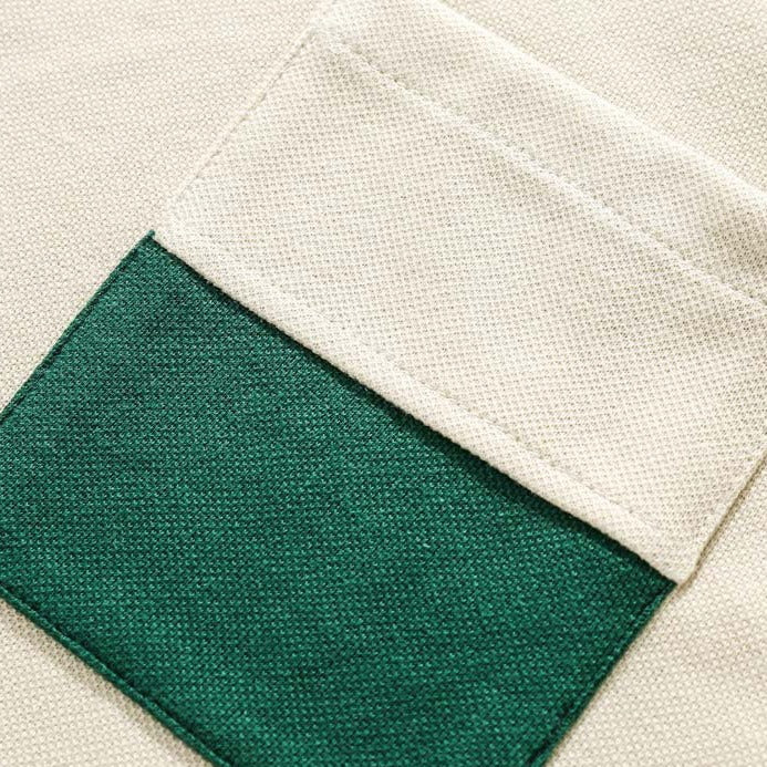 Faux layered colored polo shirt with embroidered hem